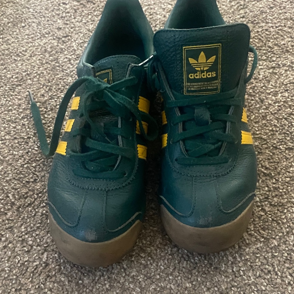Adidas Forest Green Sneakers with Yellow Stripes